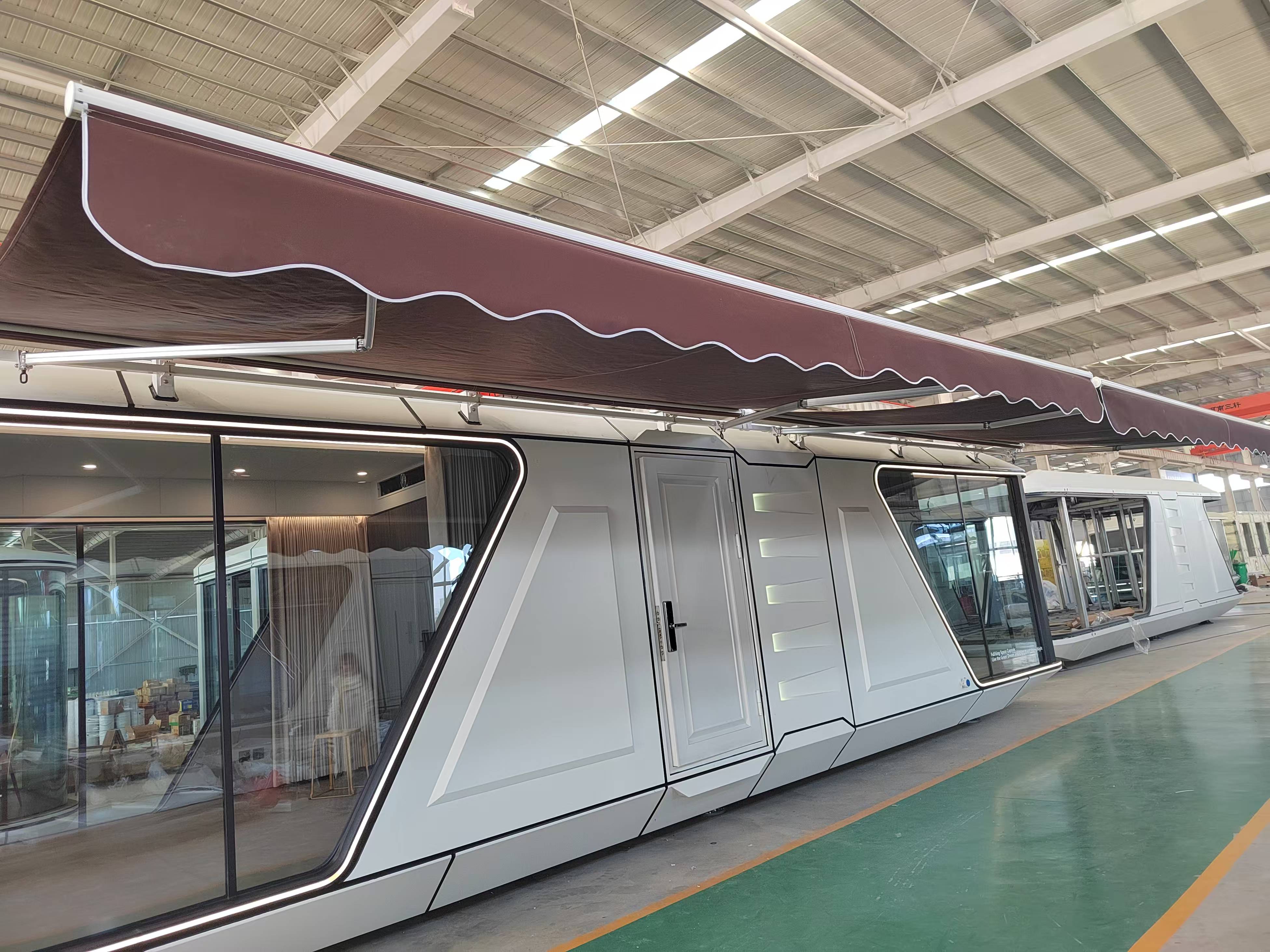 Fullking capsule house with awning